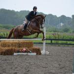 Tina Rocco and Shotgun on their way to winning the NEHC Junior Medal